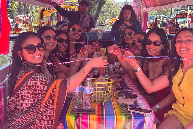 Boat Tour in Mexico City and Mezcal Fiesta with Food and ∞Drinks - The canal ride: history, music, and local color