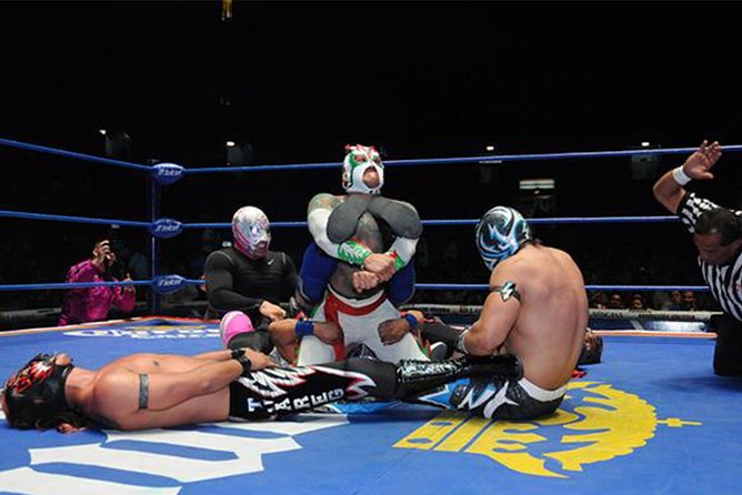 Lucha Libre Experience with Tequila, Walking Tour & Arena Show - Watching the masked wrestlers at Arena México